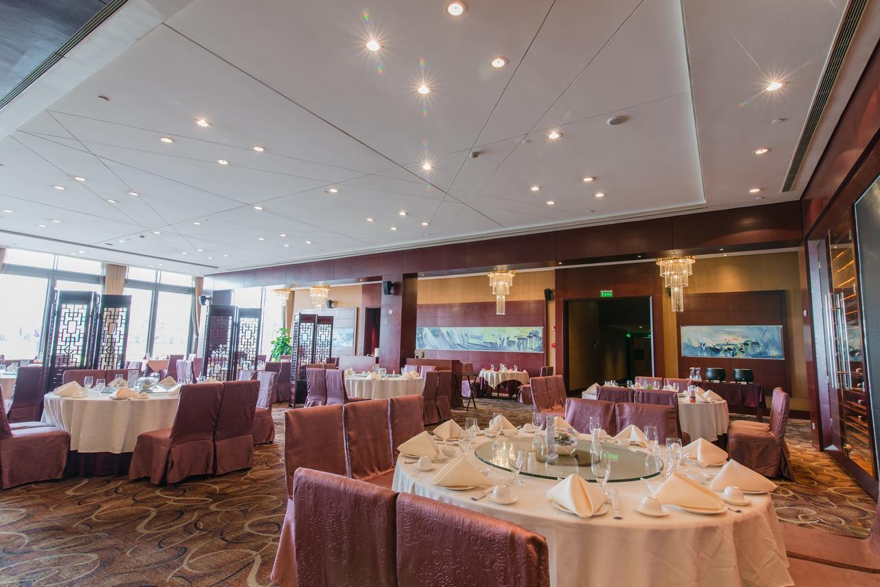 Howard Johnson Plaza Lingang Shanghai Nanhui ภายนอก รูปภาพ