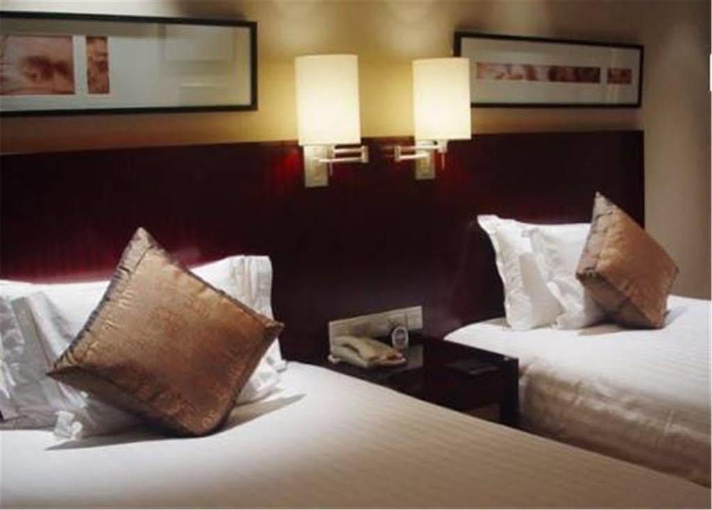 Howard Johnson Plaza Lingang Shanghai Nanhui ภายนอก รูปภาพ